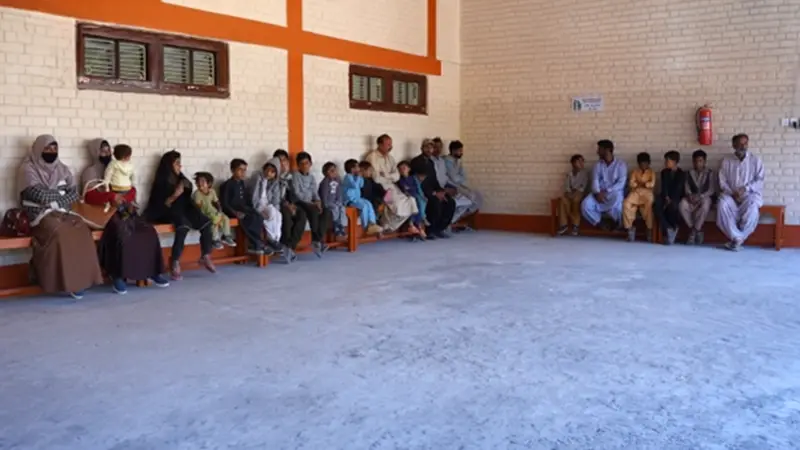 Families waiting to see a doctor at a SHINE Humanity primary healthcare clinic